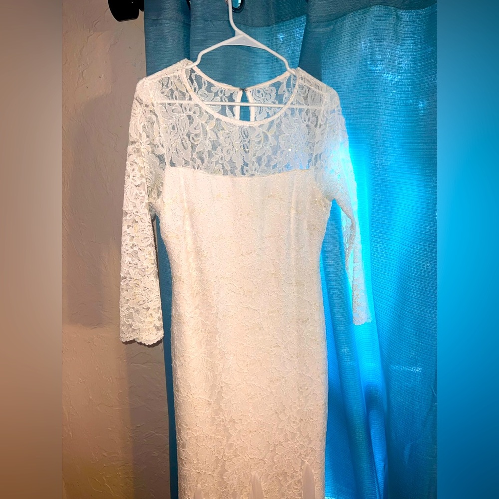 Beautiful lace onyx nite wedding or formal dress.
